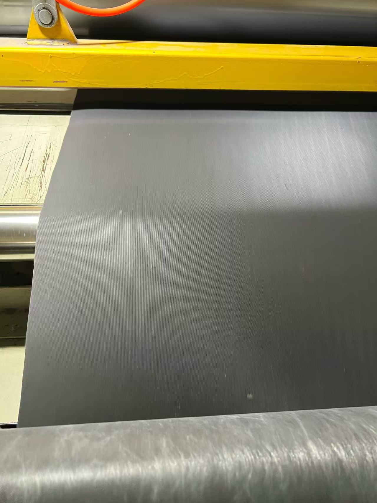 Continuous MLV sheet being processed for winding